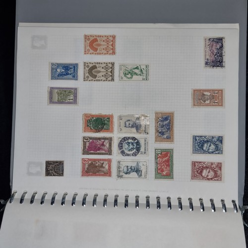 916 - A well filled stamp album containing antique and vintage examples. Features some strong pages contai... 