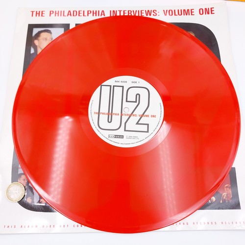 34 - A collection of two U2 LPs entitled the Philadelphia interviews volume 1&2 and two 2U magazines, as ... 