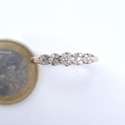 502 - Star Lot : A lovey twenty five diamond ring in 5 cluster setting in 9K gold, size N, weight 2.51 gra... 