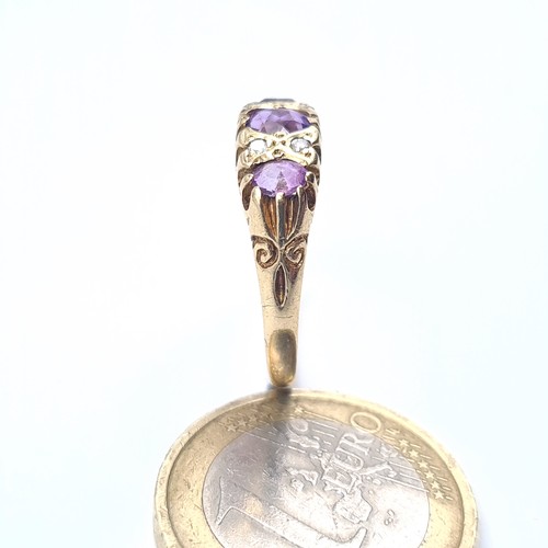 503 - Star Lot : An attractive amethyst and diamond stone vintage ring, size Q, weight 1.94 grams, boxed.