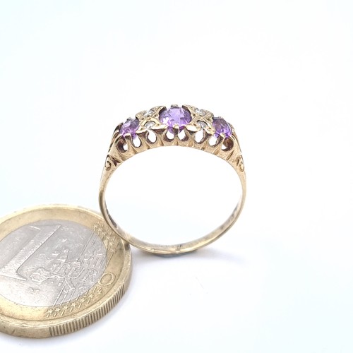 503 - Star Lot : An attractive amethyst and diamond stone vintage ring, size Q, weight 1.94 grams, boxed.