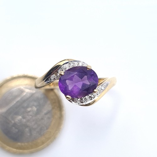 506 - Star Lot : A 9K gold amethyst stone ring set with diamond twist set mount, size T, weight 2.6 grams,... 