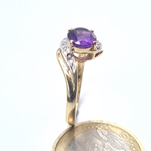 506 - Star Lot : A 9K gold amethyst stone ring set with diamond twist set mount, size T, weight 2.6 grams,... 