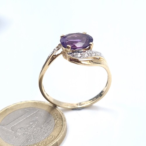 506 - Star Lot : A 9K gold amethyst stone ring set with diamond twist set mount, size T, weight 2.6 grams,... 