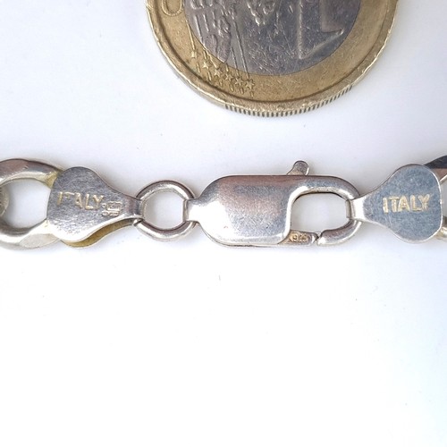 516 - A sterling silver link bracelet with lobster clasp, weight 23 grams, boxed.