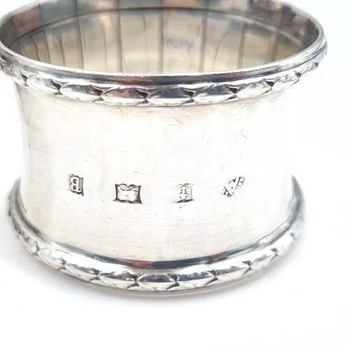 543 - A collection of five sterling silver napkin rings with various hallmarks total weight 89 grams.