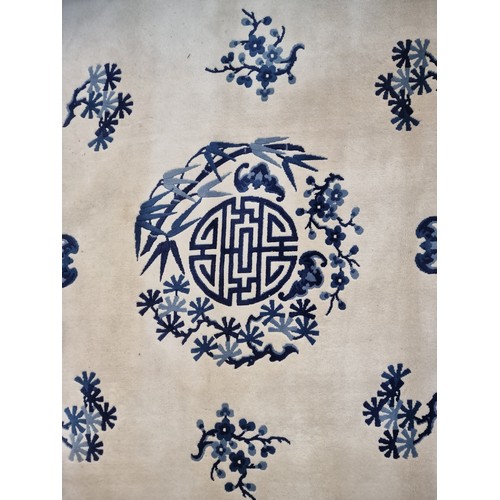 993 - Star Lot: A marvelous thick pile hand knotted woolen rug in a breathtaking blue and white Chinese pa... 