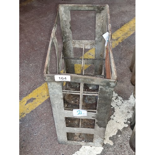 164 - Star Lot : A heavy vintage original metal crate containing 8 glass motor oil bottles branded ESSO. S... 