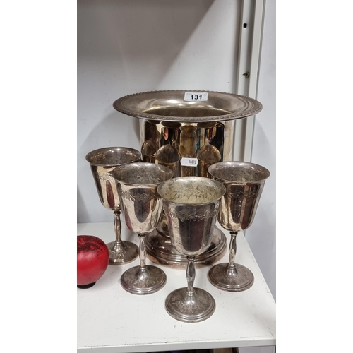 131 - Five vintage pieces of EPNS including a large double handled ice buckets and four drinking goblets.