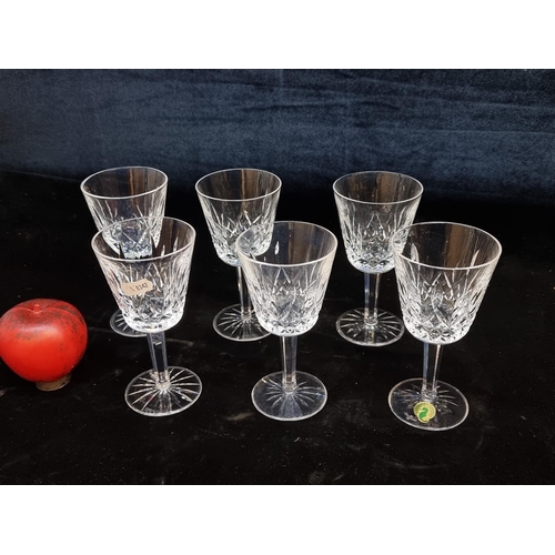 165 - A striking set of six Waterford Crystal drinking glasses in the Lismore pattern, all good condition,... 