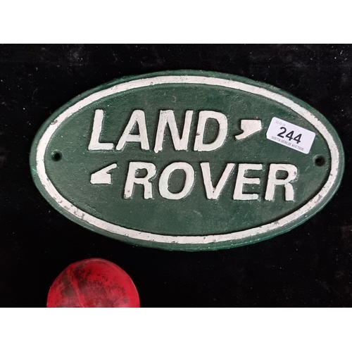 244 - A very heavy cast metal advertising wall sign for Land Rover.