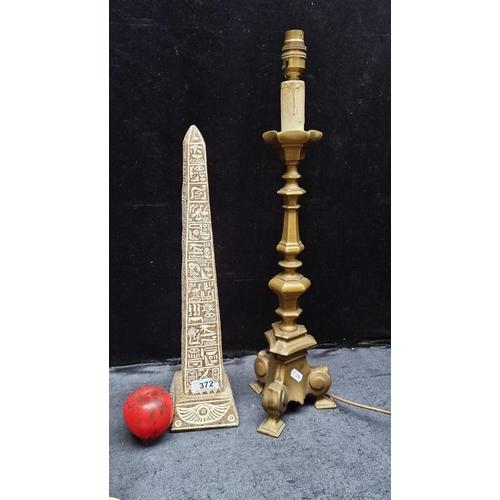 372 - An elegant heavy vintage brass table lamp along with a stone obelisk with Egyptian Hieroglyphs.