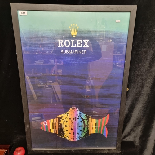 71 - A large print of a vintage advertising poster for Rolex Submariner. Held in a black wooden frame.