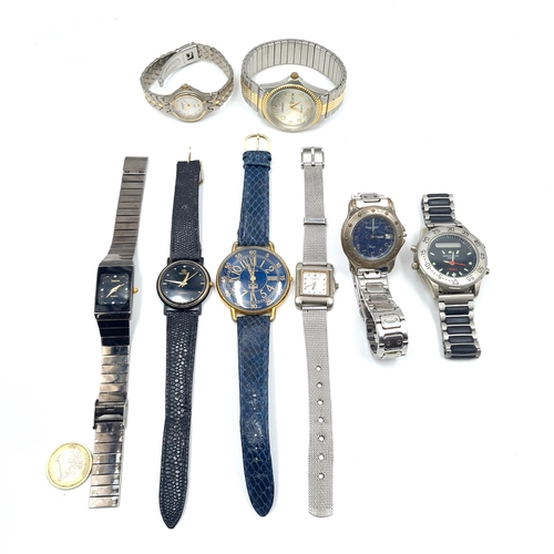 543 - A collection of eight wrist watches.