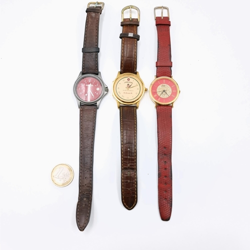 544 - Three leather strapped wrist watches. Two promotional watches. A Jameson and an Amstel together with... 