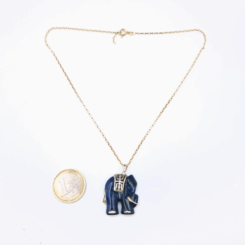 549 - A very pretty natural  Lapis Lazuli pendant necklace with nine carat gold chain. Length of chain is ... 