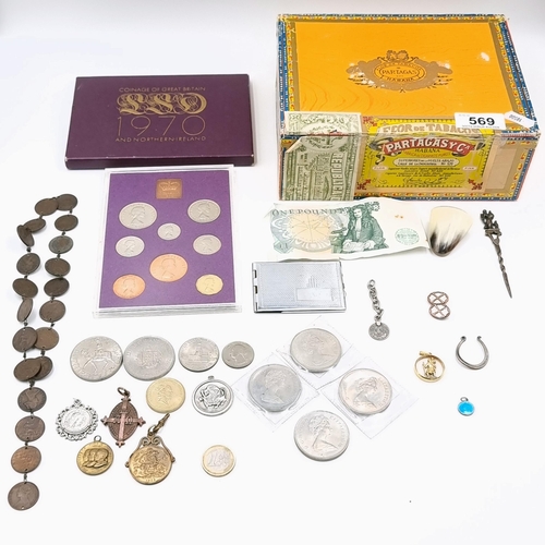 569 - A collection of coins and medallions In a cigar box.