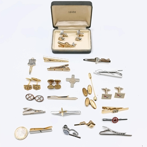 570 - A good collection of cuff links and tie pins Including a lovely as new boxed set of hunting dog and ... 