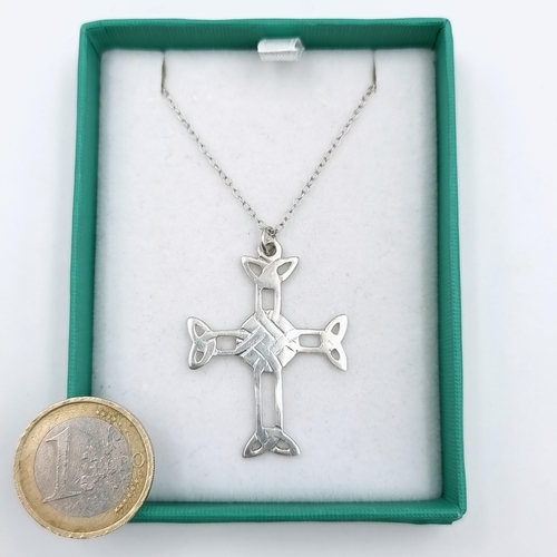 572 - A Celtic cross sterling silver pendant & chain. Lengths of chain is 48 cms. Boxed.