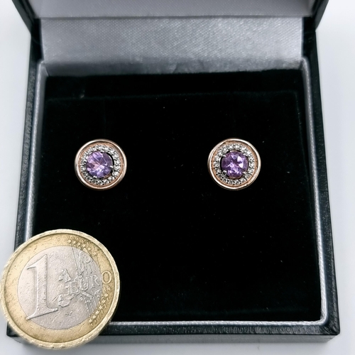 581 - A fine pair of rose gold toned sterling silver (stamped 925) amethyst stone stud earrings with white... 