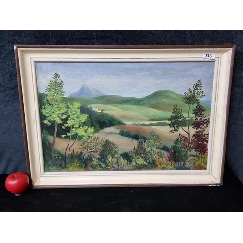 A delightful original oil on canvas painting titled "View of Sugarloaf Mountain, Co. Wicklow" dating to 1969. After work by the renowned Arthur Armstrong RHA (b.1924 - d.1996). Signed Armstrong bottom left and housed in a vintage wood and cream frame.