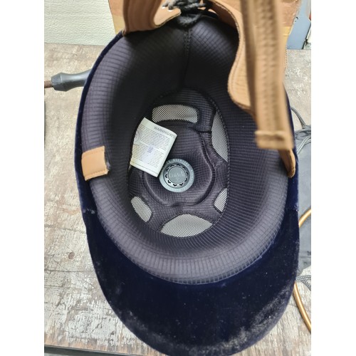 425 - A brand new Coldene CRH503 adult Prestige horse riding hat with branded dust bag. In a navy blue vel... 