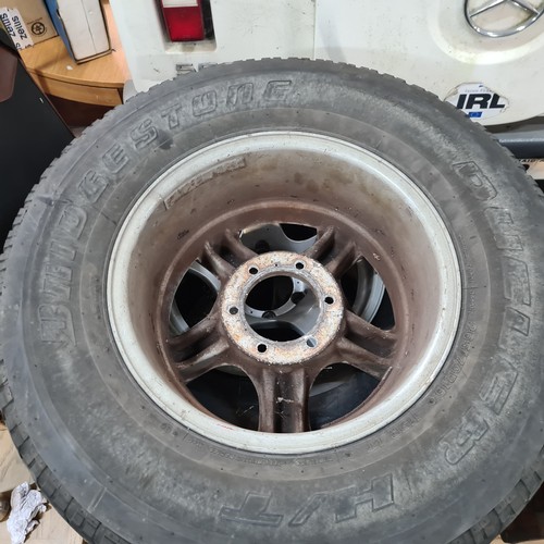 440 - Four tyres including a pair of Bridgestone Dueler H/T radial tubeless tyres along with a pair of Han... 