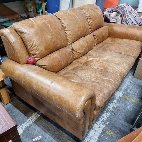 980 - Star Lot : A gorgeous large tan leather three seater sofa. In lovely condition. Beautiful Italian le... 