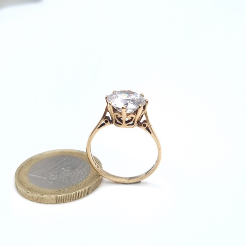 3 - A nine carat gold Large bright 2.3cts Moissanite set ring. Size - M. Weight - 2.67 grams. Boxed.