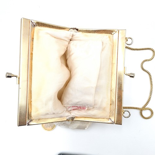 507 - A collection of four vintage bags. All in super condition. A clutch purse/bag by L. K Bennett, a met... 