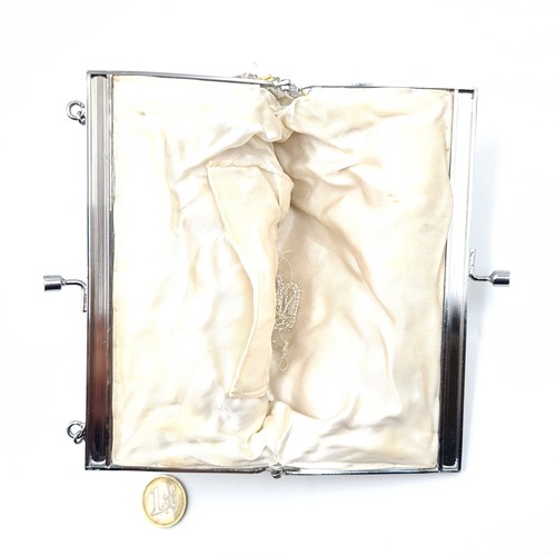 507 - A collection of four vintage bags. All in super condition. A clutch purse/bag by L. K Bennett, a met... 