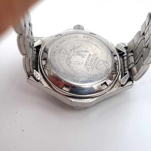 510 - A  ladies wenger swiss military wrist watch with arabic dial luminous hands sweep second hand and da... 