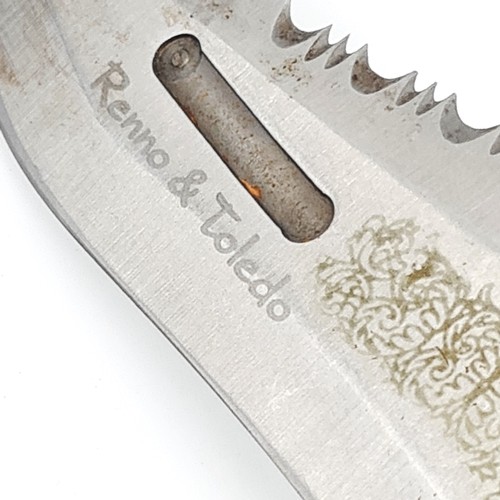 515 - A collection of five knives. Two fixed blade examples. The First made in Spain. Length 33 cms, blade... 