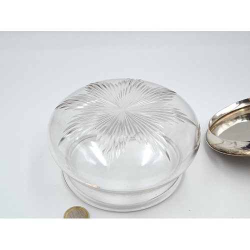 520 - A large circular powder dish set with sterling silver lid hallmarked Birmingham. Weight of lid 95 gr... 