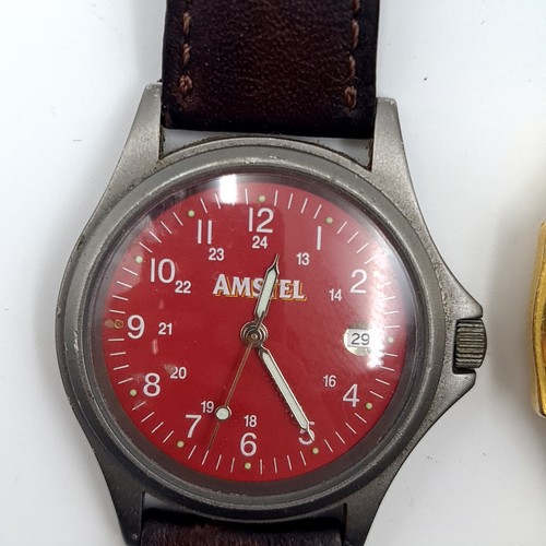 544 - Three leather strapped wrist watches. Two promotional watches. A Jameson and an Amstel together with... 