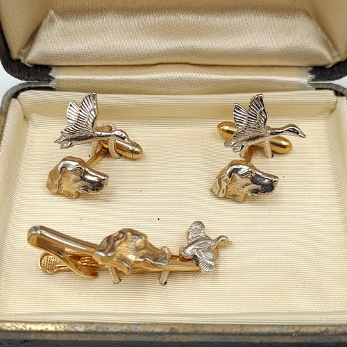 570 - A good collection of cuff links and tie pins Including a lovely as new boxed set of hunting dog and ... 