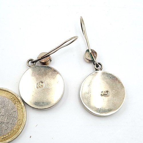 578 - A pair of sterling silver enamel earrings suitable for pierced ears. Weight is 6 grams. Stamped 950.