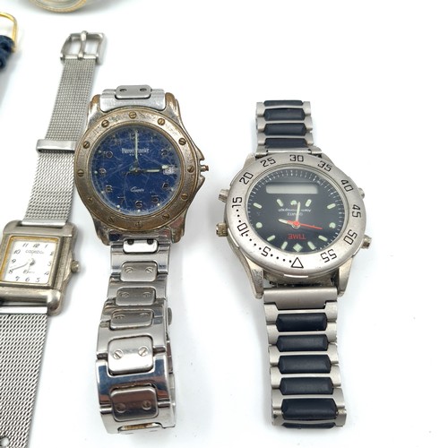 543 - A collection of eight wrist watches.