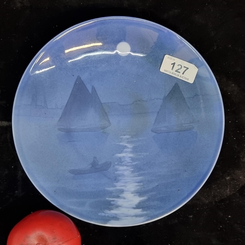 127 - A gorgeous Swedish Rörstrand porcelain plate featuring a moonlit scene with boats. In good condition... 