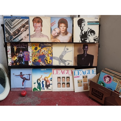 134 - A excellent collection of approx. 45 LP records from artists including Bowie x 2, The Pogues, Soft C... 