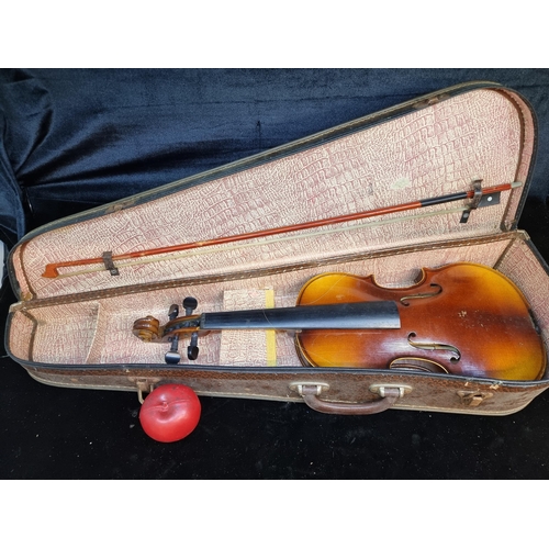 192 - A vintage violin in case with horsehair bow. Labelled Antonius Stradivarius, Cremona 1731 to interio... 