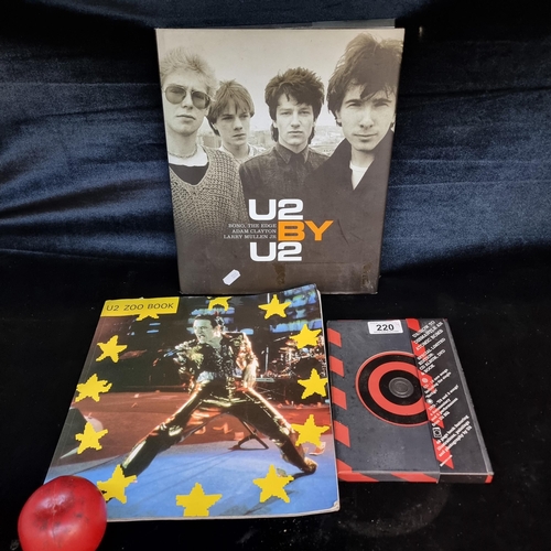 220 - 4 items of U2 band interest including one hardback book titled 'U2 by U2', a special limited edition... 