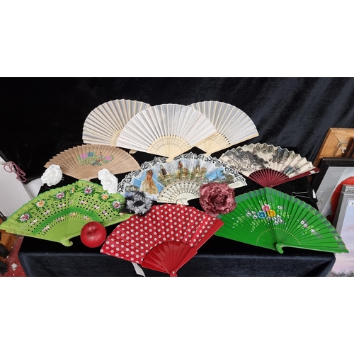 247 - A selection of eight pretty hand fans including oriental examples.