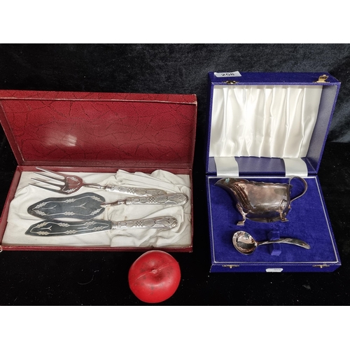 258 - A gorgeous vintage saucière set along with a large ornate silverplated fish knife and fork set.