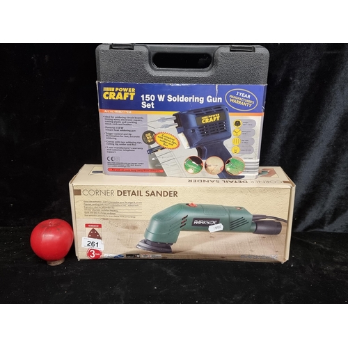 261 - Two high quality handheld tools including a Parkside corner detail sander and a Power Craft 150W sol... 