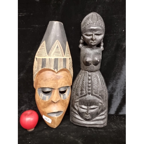 262 - Two interesting pieces of African tribal art including a mask.