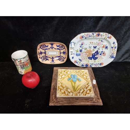 276 - Four items including a heavy decorative wall hanging tile, a hand painted serving platter and a golf... 