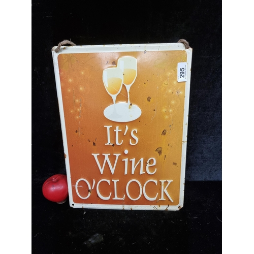 295 - A fun metal wall sign reading 'It's Wine O'Clock'.