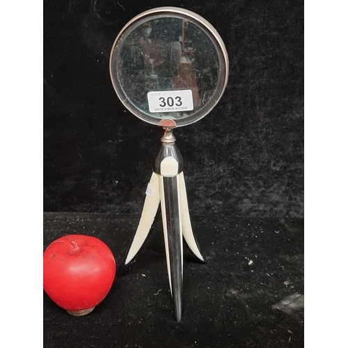 303 - A gorgeous Art Deco style magnifying glass sat on a two toned tripod base.