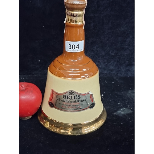 304 - A 1970's sealed Bell's Scotch Whisky decanter. Sealed and full